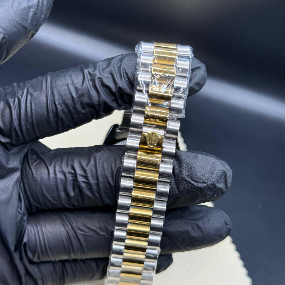 Rolex oyster perpetual truetone with golen dial with date Saloora