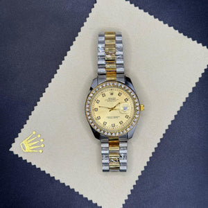 Rolex oyster perpetual truetone with golen dial with date Saloora