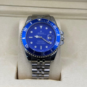 Rolex submariner silver with blue rotating dial with date Saloora
